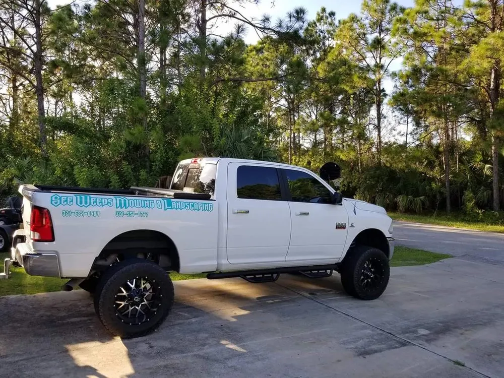 Local landscape design with custom design in Palm Bay, FL by See Weeds Mowing and Landscaping