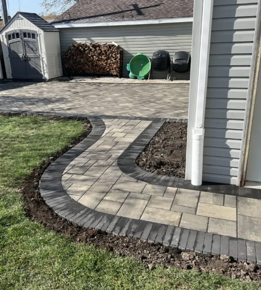 Custom landscape installation with custom design in Quincy, MA by Select Home Improvements