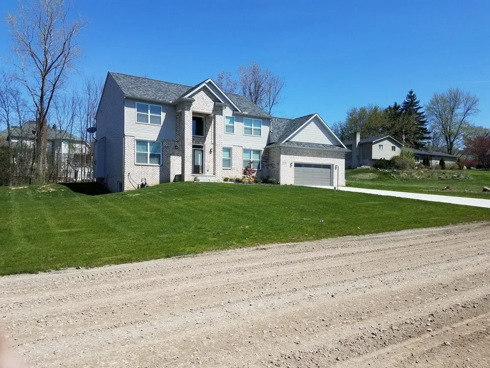 Custom garden landscaping in South Lyon, MI by Selective Soils And Services