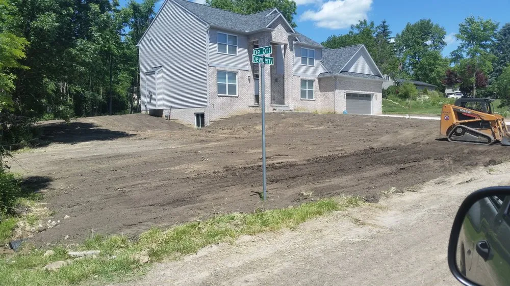 Custom landscape design for beautiful yards in South Lyon, MI by Selective Soils And Services