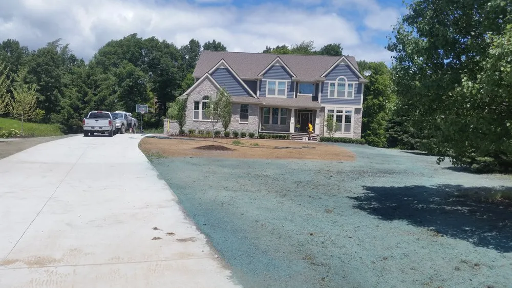 Expert outdoor landscaping for homes in South Lyon, MI by Selective Soils And Services