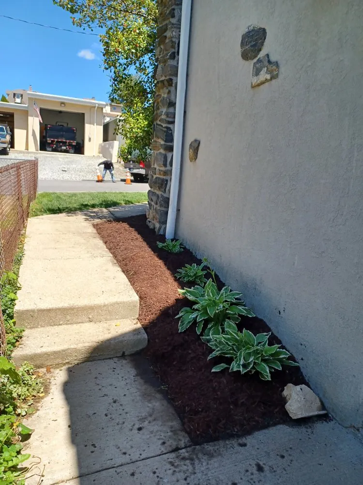 Custom outdoor landscaping with custom design in Bryn Mawr, PA by Selena's Landscape, Design & Tree Service