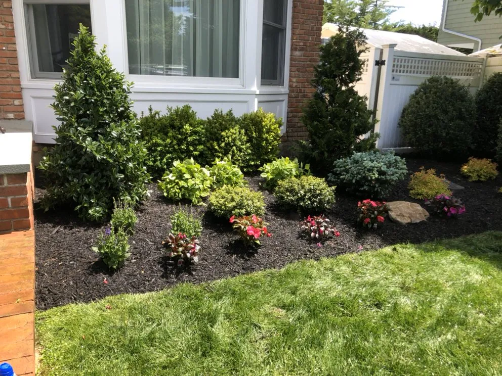 Custom residential landscaping for year-round maintenance in Wantagh, NY by Sequoia Outdoor Living