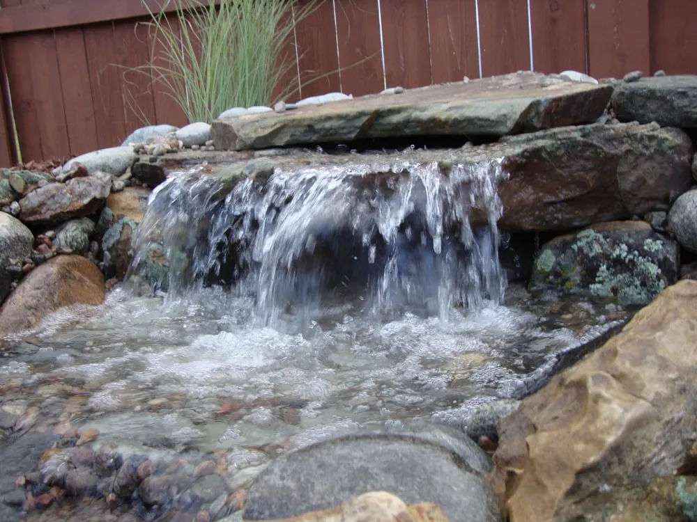 Top-rated landscaping services for year-round maintenance in Colorado Springs, CO by Serenity Falls Water Features