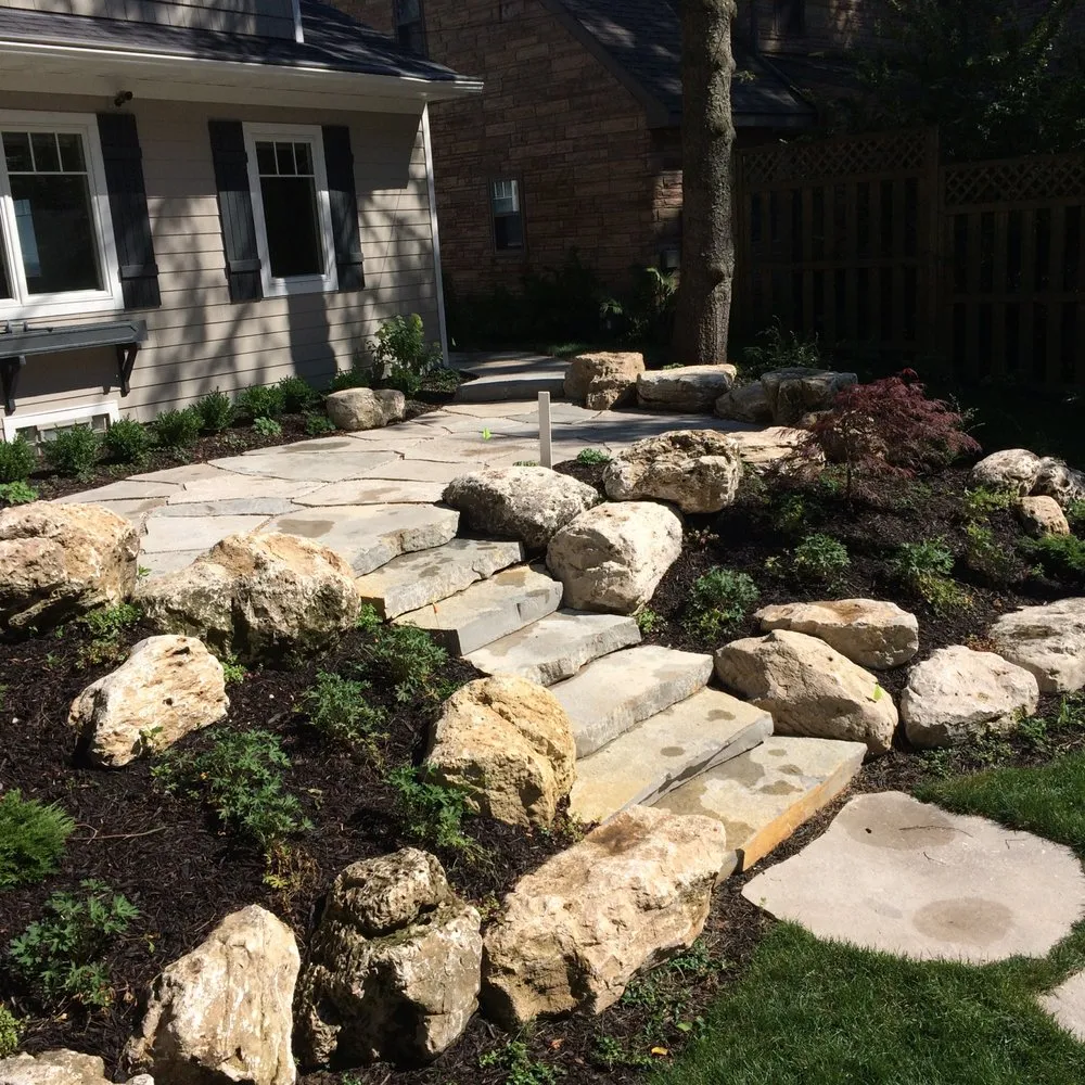 Professional lawn care service for homes in Sheboygan, WI by Serenity Farm Landscaping