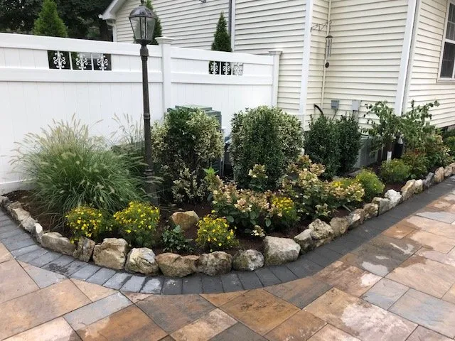 Top-rated landscape design with custom design in St. James, NY by Serf & Turf Landscaping