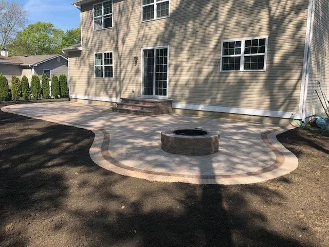 Professional yard cleanup service with custom design in St. James, NY by Serf & Turf Landscaping