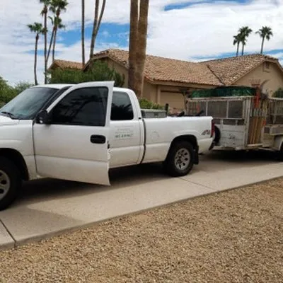 Sergio's Lawn Services Logo