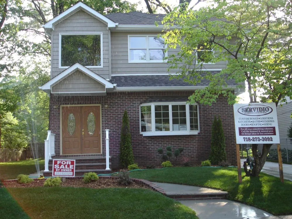 Reliable yard cleanup service for year-round maintenance in Staten Island, NY by Servidio Building