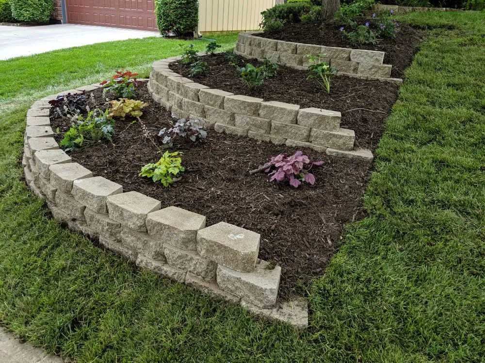 Expert yard cleanup service with custom design in Kansas City, KS by SES Landscape