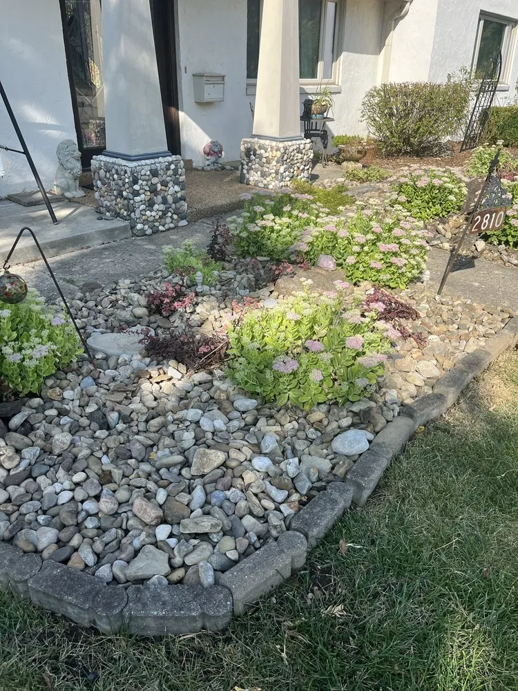 Local garden landscaping with custom design in Reynoldsburg, OH by Seven J Home And Lawn
