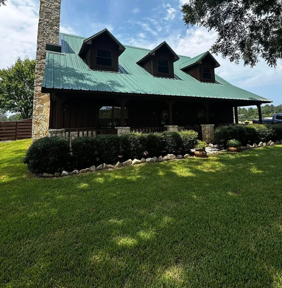 Local landscape installation for year-round maintenance in Lufkin, TX by Seymore Home Improvements