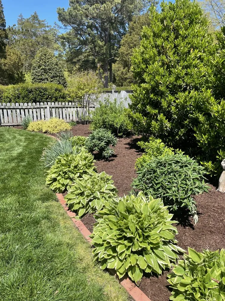 Professional garden landscaping with custom design in Yorktown, VA by S&F Lawn Care