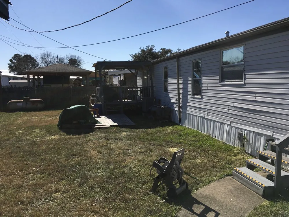 Affordable lawn mowing service for homes in Houston, TX by S.F.A. Landscaping