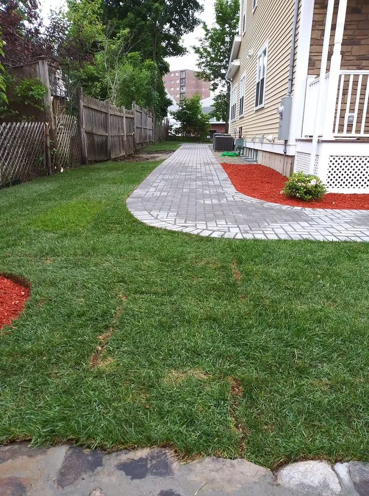 Professional lawn care service for residential properties in Quincy, MA by S&G Landscape Service