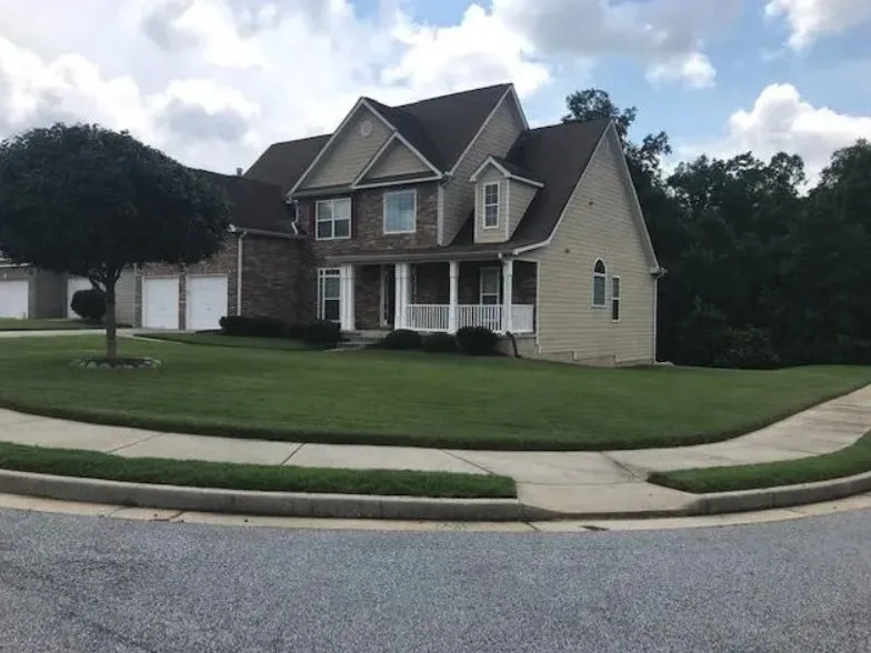 Local yard cleanup service with custom design in Covington, GA by SGM Landscaping