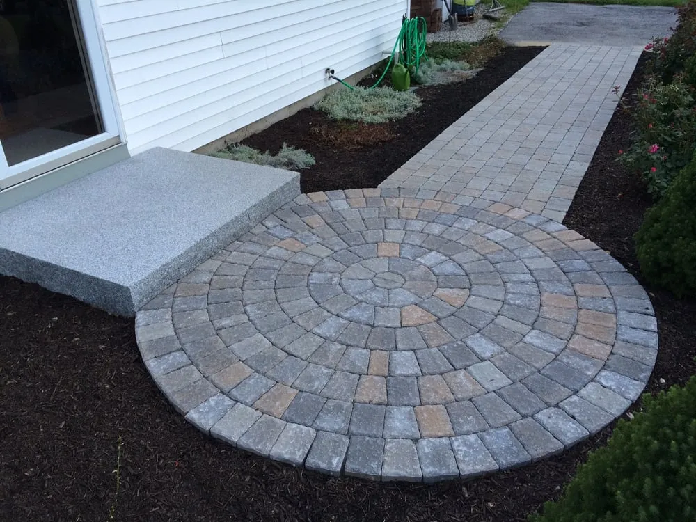 Custom yard maintenance for year-round maintenance across Auburn, NH - Shade Tree Landscaping