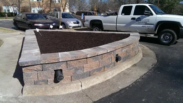 Shade Tree Lawn & Landscape Logo