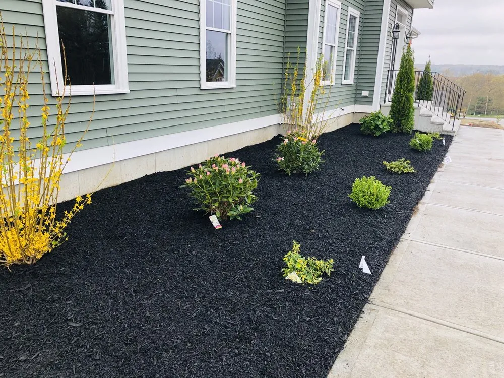 Professional lawn mowing service for beautiful yards in Milford, MA by Shades of Green Lawn & Landscaping