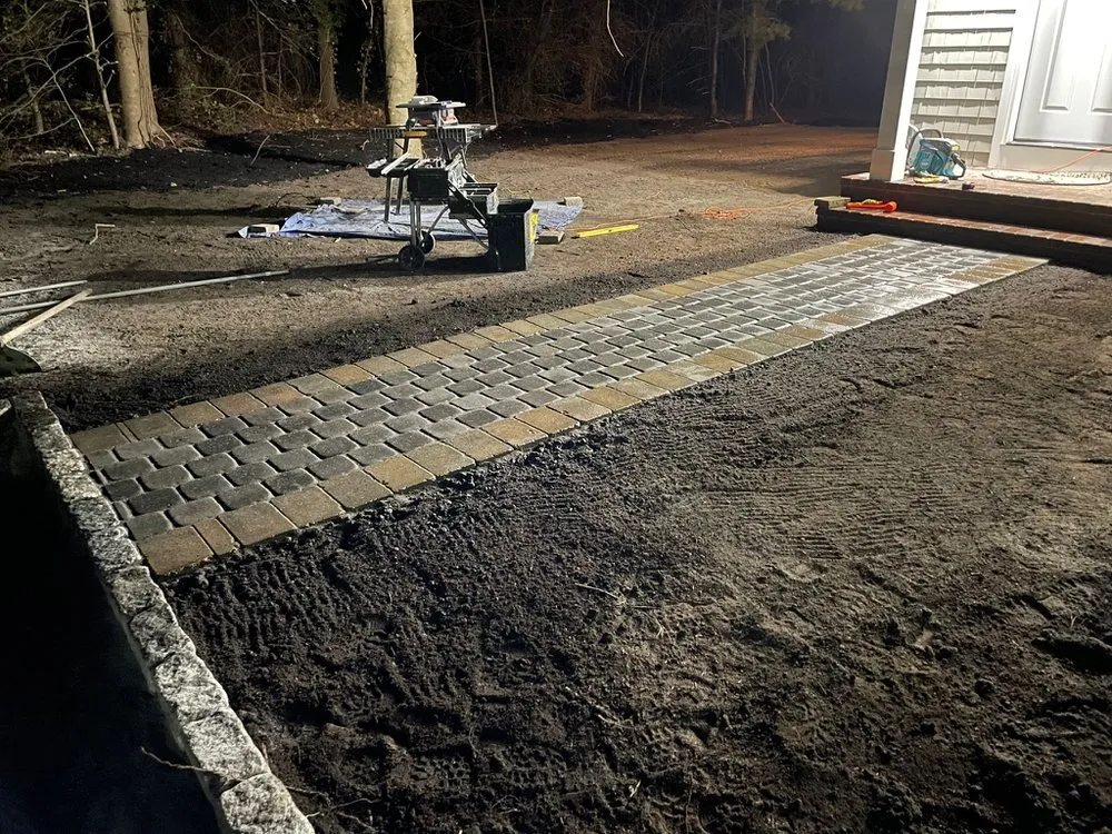 Reliable lawn mowing service in Mashpee, MA by Shalom Masonry