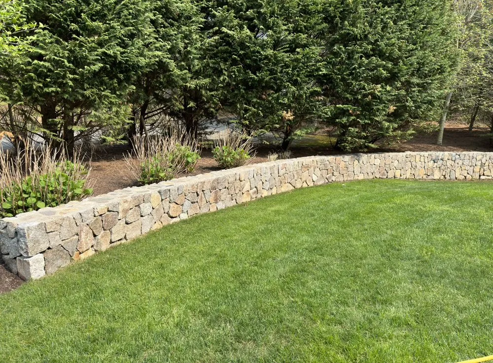 Professional landscape design for homes in Mashpee, MA by Shalom Masonry