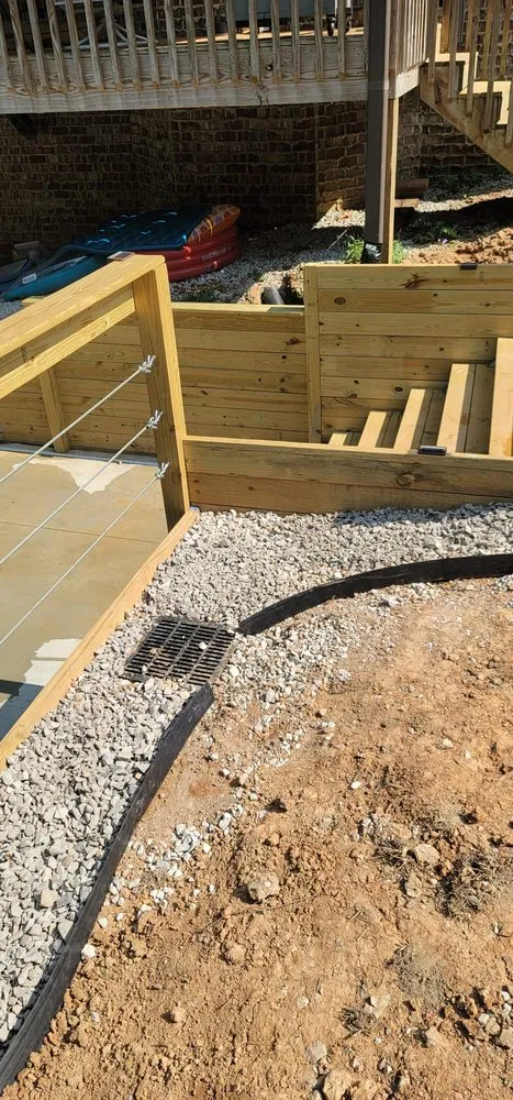 Professional lawn mowing service for outdoor upgrades in Semmes, AL by Shamp Services