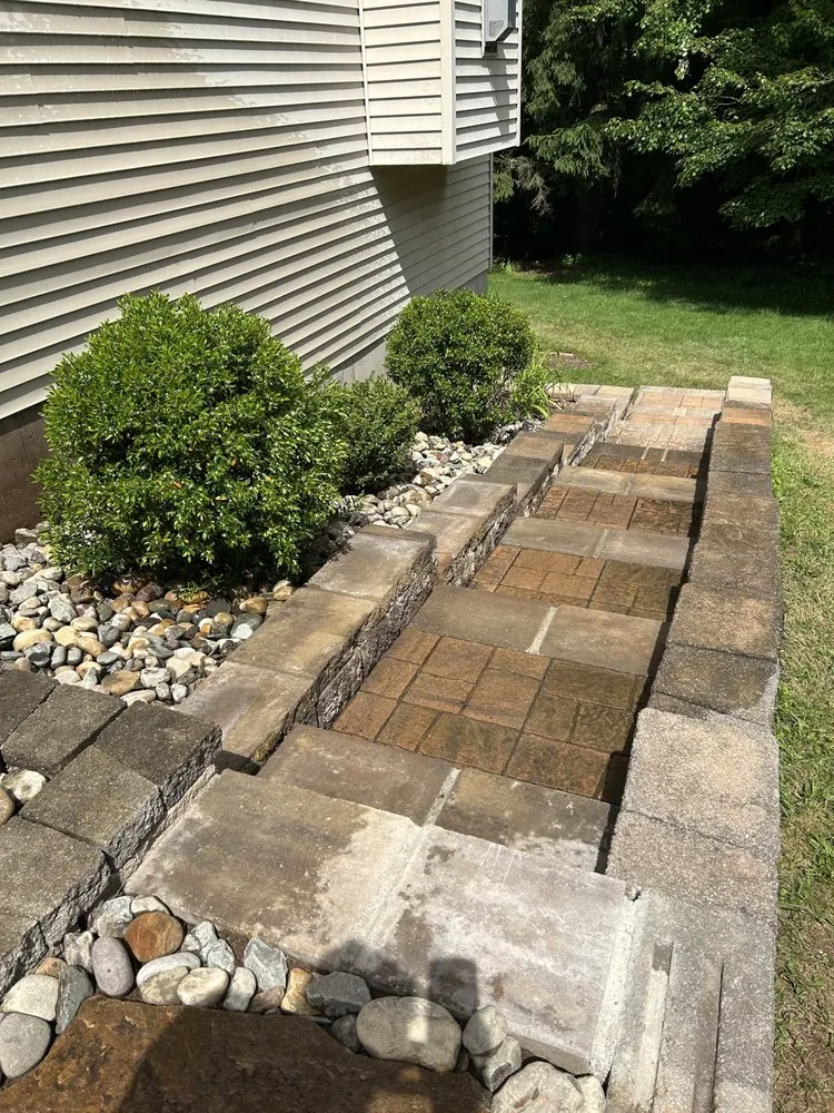 Affordable lawn mowing service for homes across Bethel, CT - ShamROCKS Masonry & Landscaping