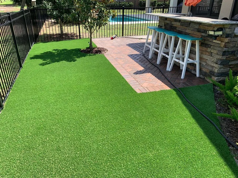 Trusted lawn care service in Orlando, FL by Shark Outdoors