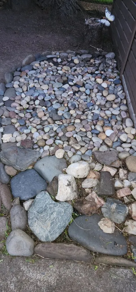 Local lawn mowing service for year-round maintenance in central point, OR by Sharkbait and Sons