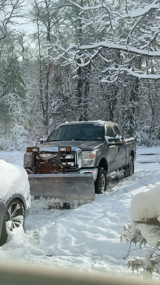 Affordable lawn mowing service for residential properties in Sharon, MA by Sharon Landscape