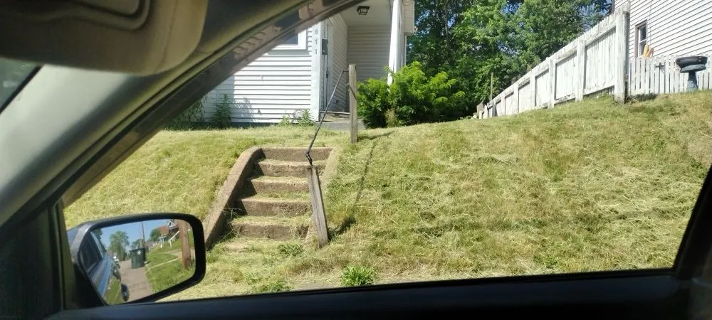 Expert yard cleanup service for outdoor upgrades in Uniontown, OH by Sharp Blade Mowing