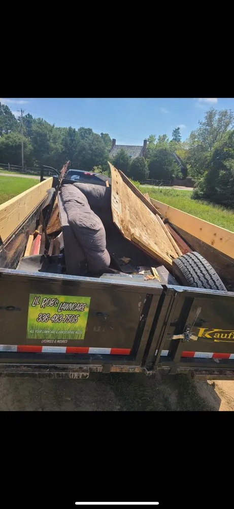 Professional yard cleanup service in Lewisville, NC by Sharp Edge Enterprises