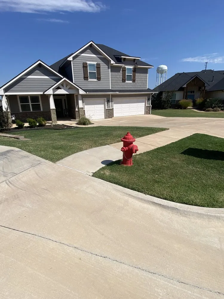 Local landscape installation for homes in Yukon, OK by Sharp Lawn Care