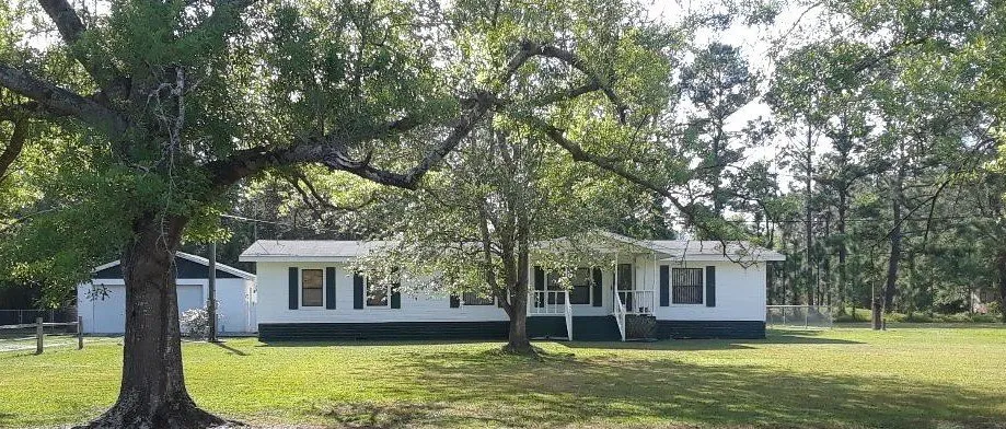 Expert garden landscaping for homes in Jacksonville, FL by Sharper Image Lawn Care