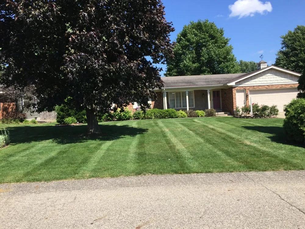 Professional yard cleanup service experts serving Zeeland, MI - Sharper Image Lawn Maintenance & Snowplowing