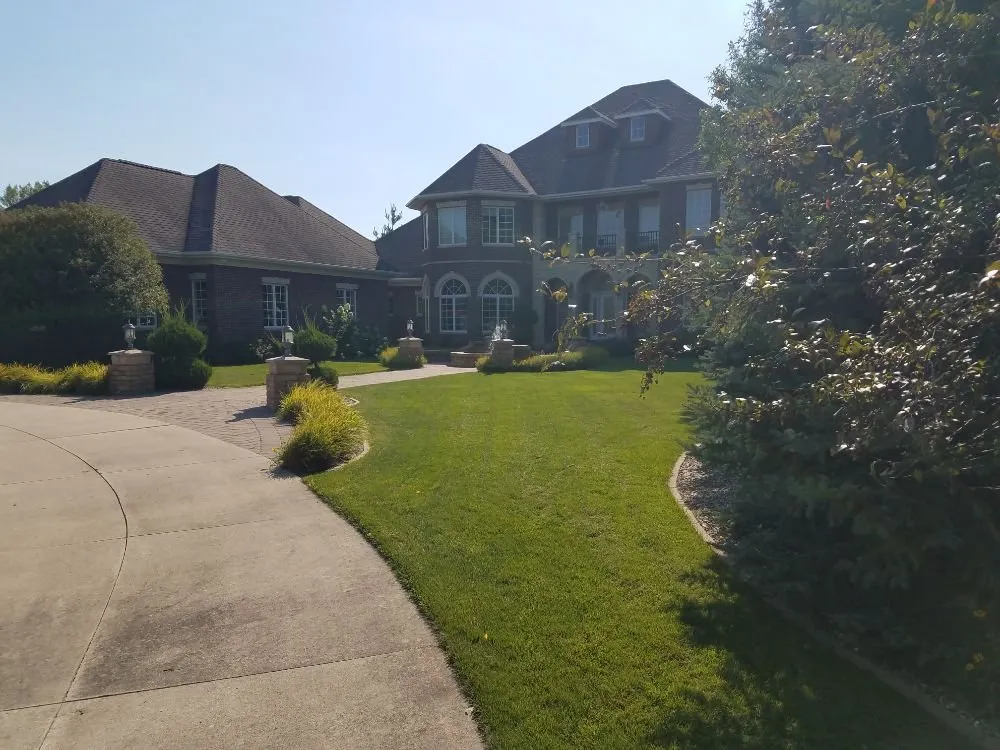 Affordable lawn mowing service for year-round maintenance across Cedar Falls, IA - ShaWorks