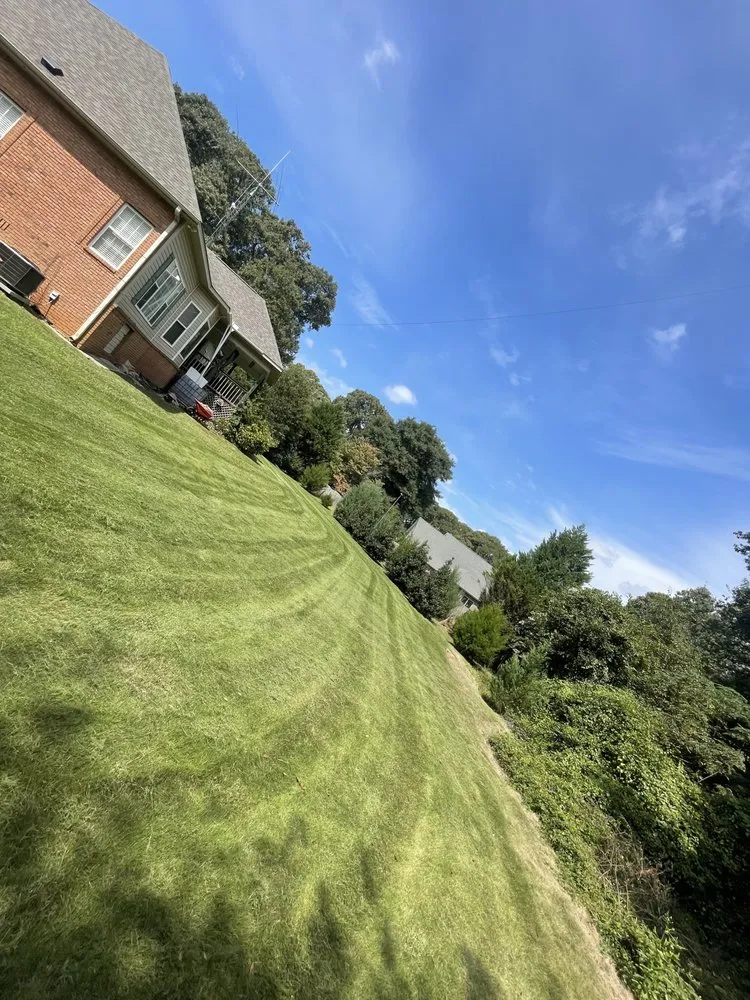 Affordable lawn mowing service with custom design in Bonaire, GA by Shawscapes Landscaping