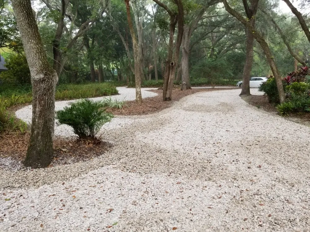 Custom lawn care service for year-round maintenance in Bradenton, FL by Shell Driveways and Landscape
