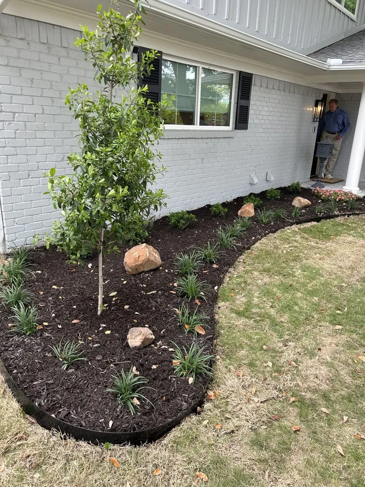 Professional yard maintenance for homes in Carrollton, TX by SHINEscapes