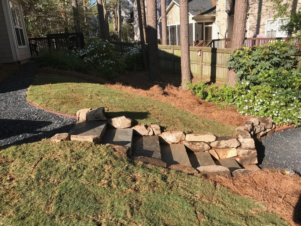 Custom lawn care service for year-round maintenance in Atlanta, GA by SHM Landscape