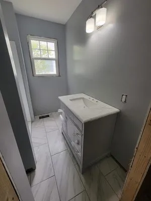 Shook's Property Maintenance Logo