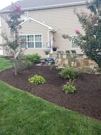 Affordable yard cleanup service for year-round maintenance in Stewartstown, PA by Shoop's Services