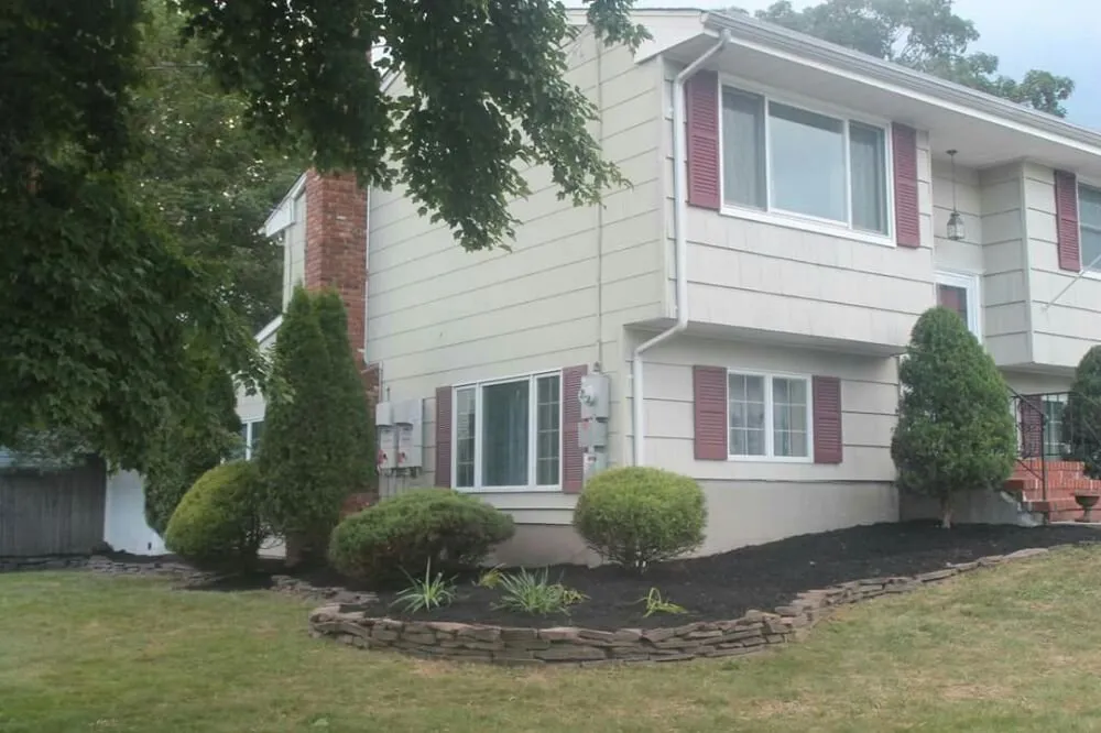 Professional landscape design for homes in East Windsor, NJ by Short And Sweet Landscaping