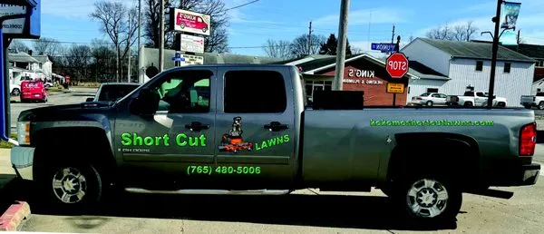 Short Cut Lawn Care Logo