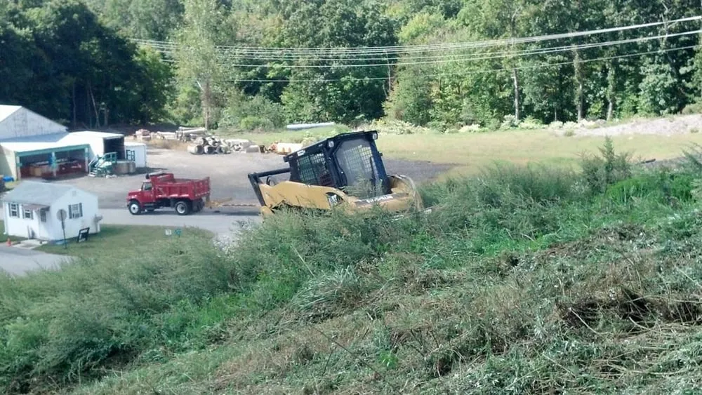 Local lawn care service for year-round maintenance in Colchester, CT by Shorts Landscaping