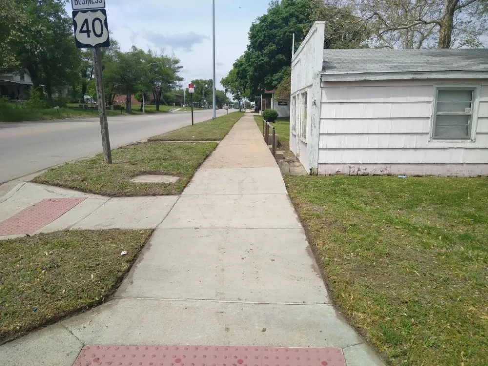 Professional lawn mowing service for residential properties in Junction City, KS by Shorty’s Lawn Service