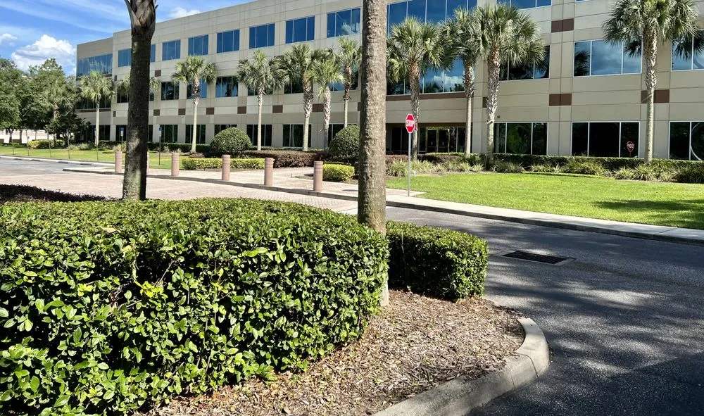 Professional residential landscaping in Sun City, FL by Shrub Masters