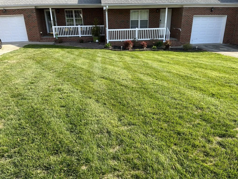 Custom landscape installation for year-round maintenance in Mebane, NC by Shumaker’s lawn care