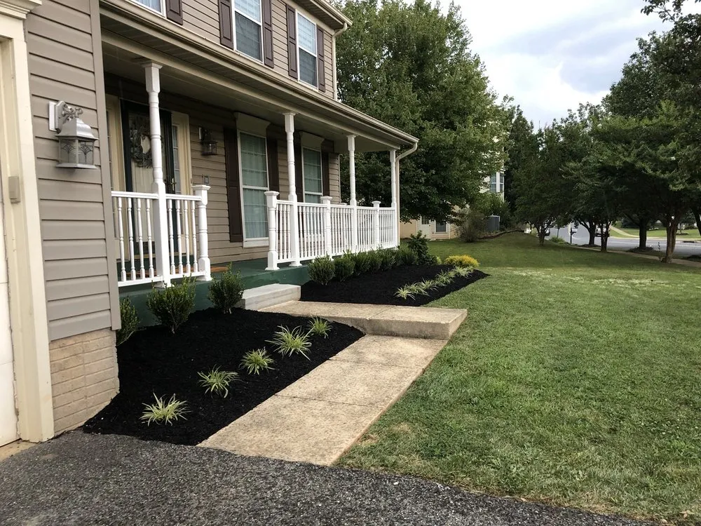 Custom yard cleanup service for year-round maintenance in Churchville, MD by Sibila's Landscaping