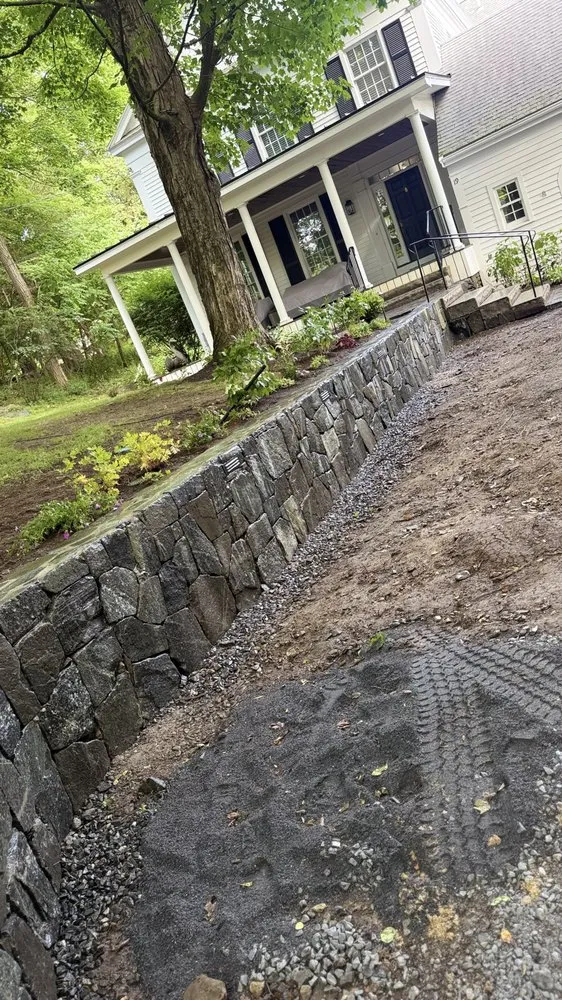 Professional outdoor landscaping for residential properties in Framingham, MA by Side Job Landscaping